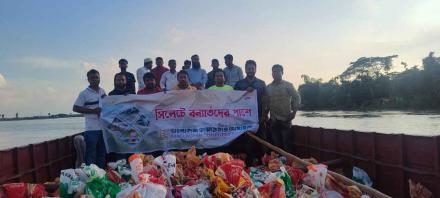 Giving relief to Sylhet flood victims on behalf of Bangladesh Computer Society.